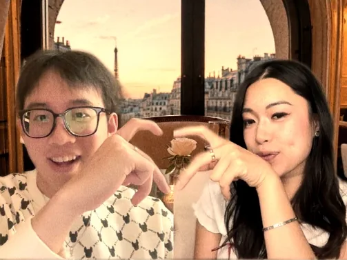 The same couple in one strip frame from two rooms, at a Paris window at golden hour, each making half a finger-heart so the halves meet in the middle.